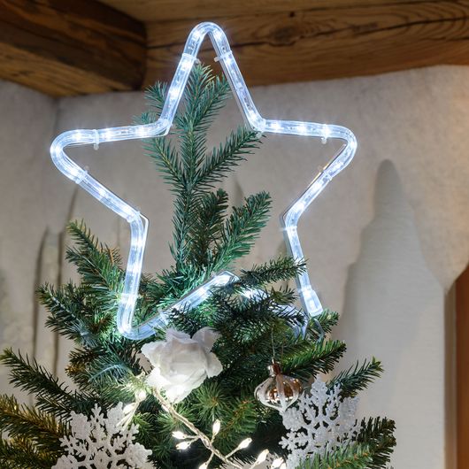 Stella luminosa a luce fredda usata come puntale dell’albero di Natale